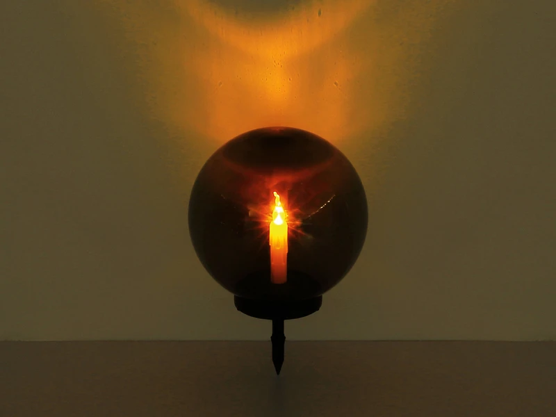 Globo LED Solarkugel Mit Kerze - Leuchtkugel Rauchfarbig Ø 25cm Mit Erdspieß 6 Globo LED Solarkugel Mit Kerze - Leuchtkugel Rauchfarbig Ø 25cm Mit Erdspieß – Bild 4