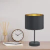 Trio Leuchten Tischleuchte HOSTEL Stoff Lampenschirm Ø 20cm Schwarz & Gold